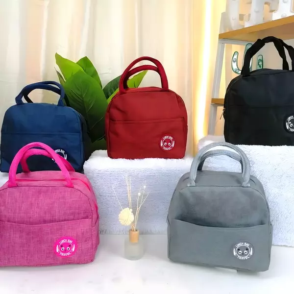 1 - Bolsa lonchera térmica impermeable con interior de aluminio y bolsillo frontal