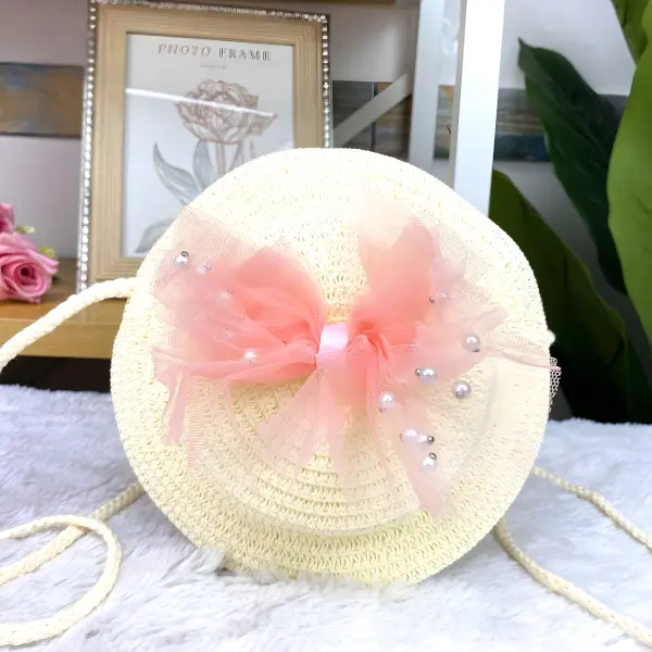 13 - Bolsita infantil redonda tipo sombrero de paja con aplicaciones tiernas