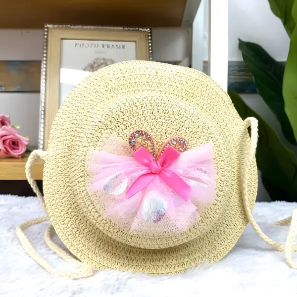 1 - Bolsita infantil redonda tipo sombrero de paja con aplicaciones tiernas