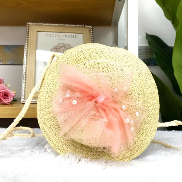 7 - Bolsita infantil redonda tipo sombrero de paja con aplicaciones tiernas