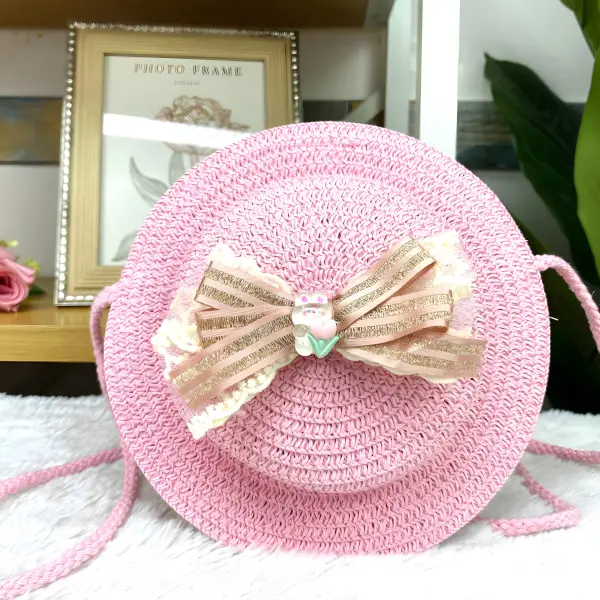 8 - Bolsita infantil redonda tipo sombrero de paja con aplicaciones tiernas