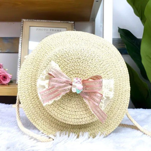12 - Bolsita infantil redonda tipo sombrero de paja con aplicaciones tiernas